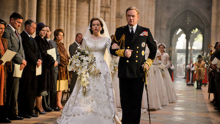 King George IV (Jared Harris) escorts his daughter Elizabeth (Claire Foy) down the aisle at her wedding | Netflix